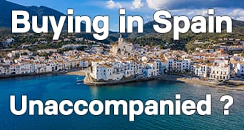 Costa Brava in Spain with "Buying in Spain Unaccompanied" written