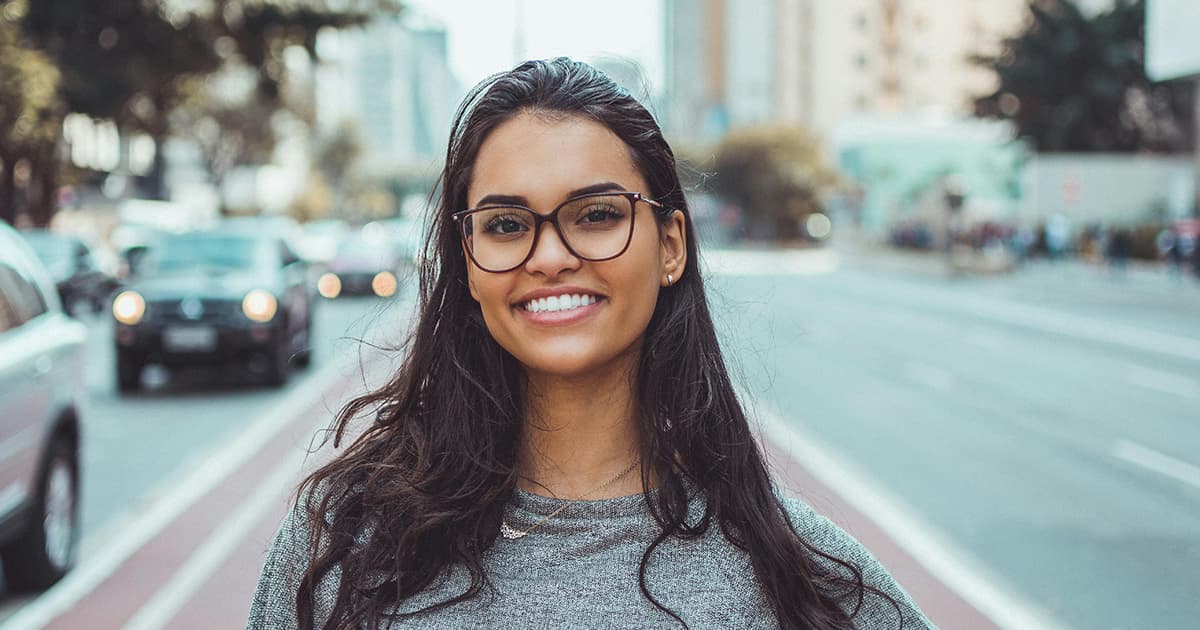 Girl with glasses in the streets of spain