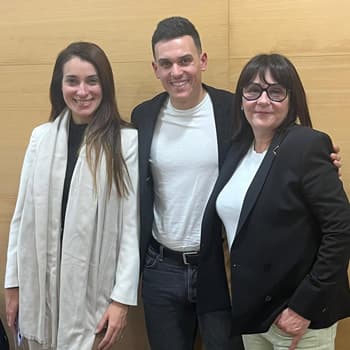 Two women and a man at the notary's office.