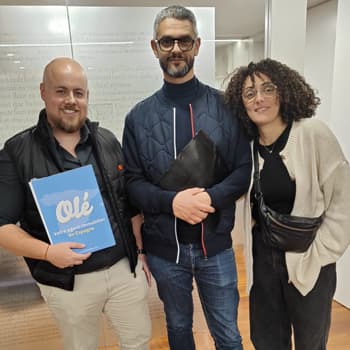 A real estate hunter with a couple at the notary’s office after purchasing a house in Spain