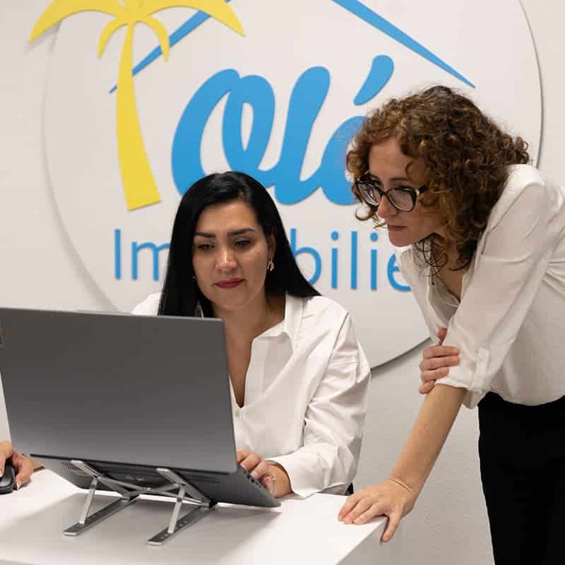 Administrative team of SpainEasy reviewing a client’s file together