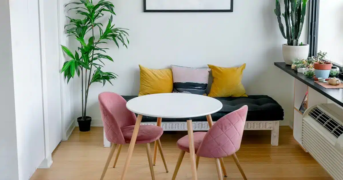 Bright modern living room of an apartment in Spain with colorful decor, representing Spanish real estate in 2025